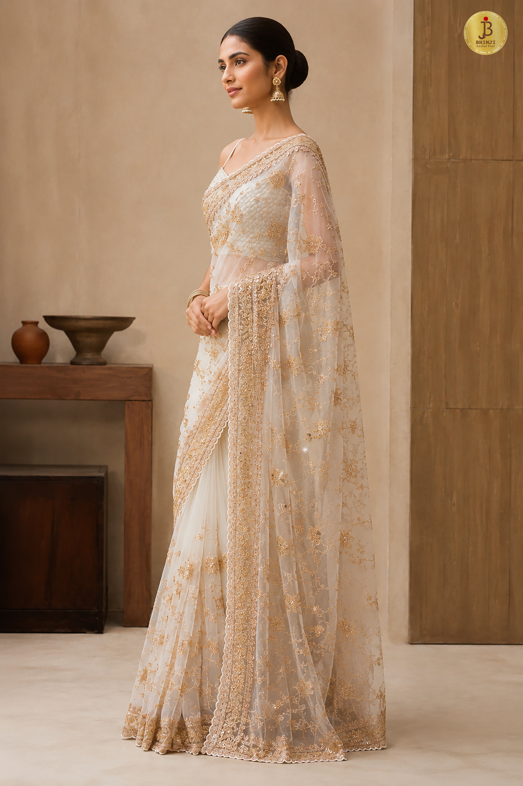 Royal Off-White Hand Embroidered Net Saree