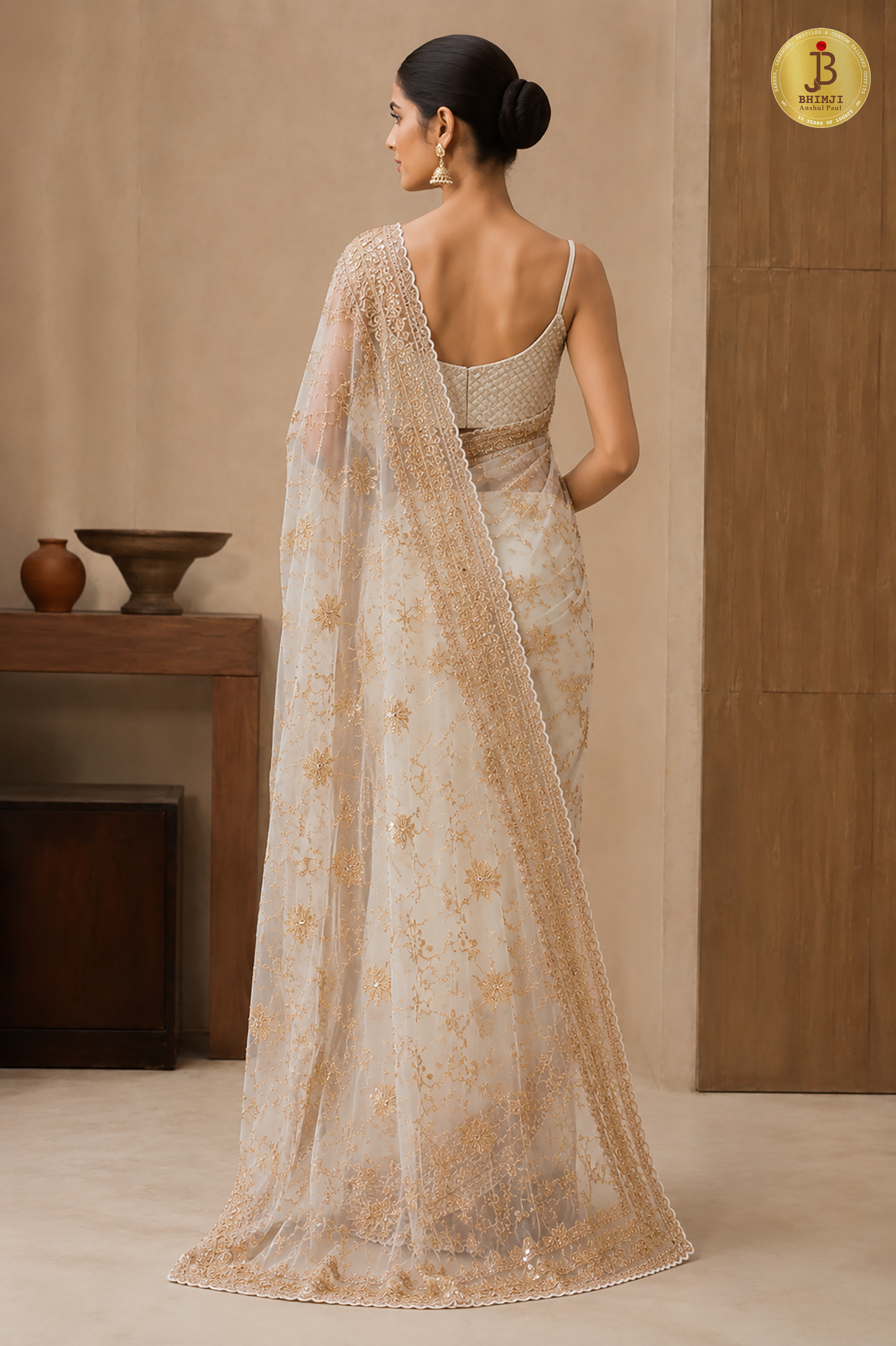 Royal Off-White Hand Embroidered Net Saree