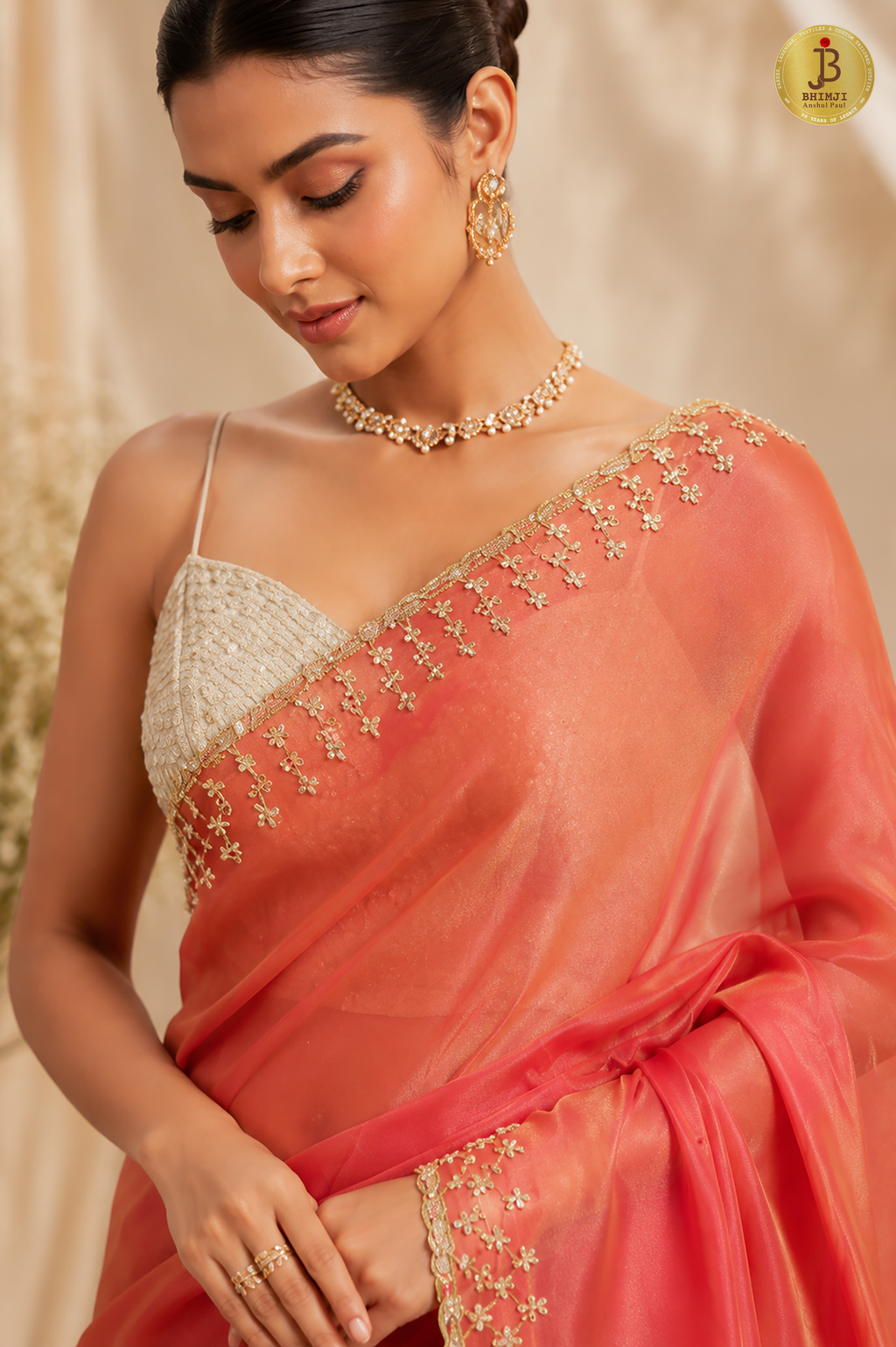 Rosé Noor Hand-Embellished Coral Tissue Saree with Gold Zari Work