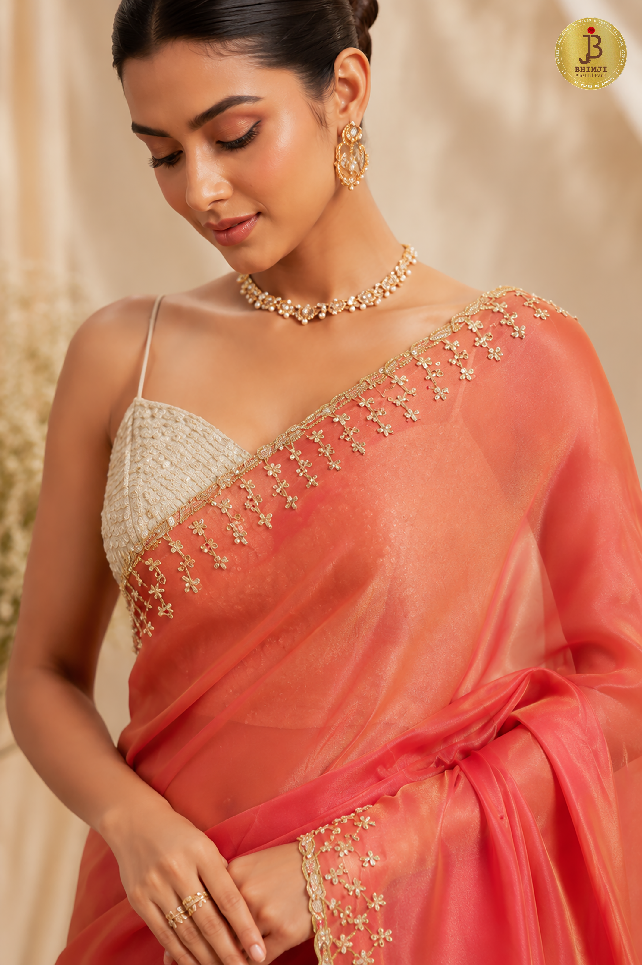 Rosé Noor Hand-Embellished Coral Tissue Saree with Gold Zari Work